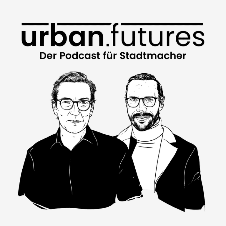 Zwei Männer mit Brillen, einer in schwarzem Hemd, der andere in weißem Sakko, stehen nebeneinander. Logo des Podcasts "u...